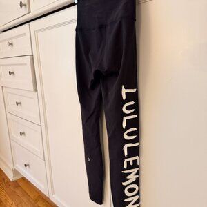 Lululemon women's 7/8 length black leggings, size 2